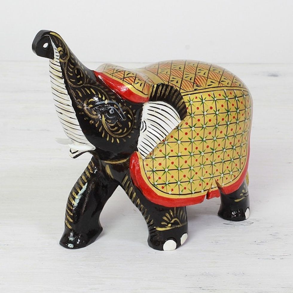 Handcrafted Black Elephant Wood Figurine with Golden Coat 'Elephant Fortune'