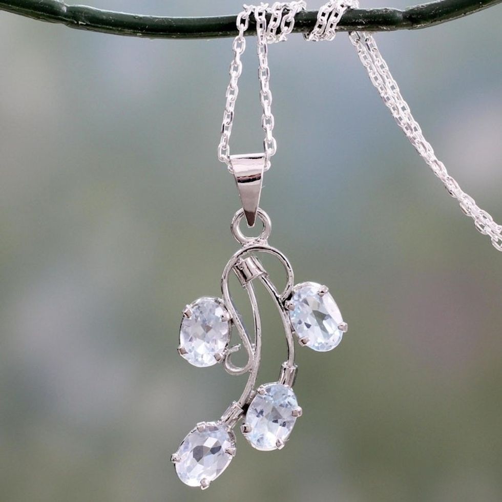 Polished Sterling Silver and Blue Topaz Pendant Necklace 'Fidelity'