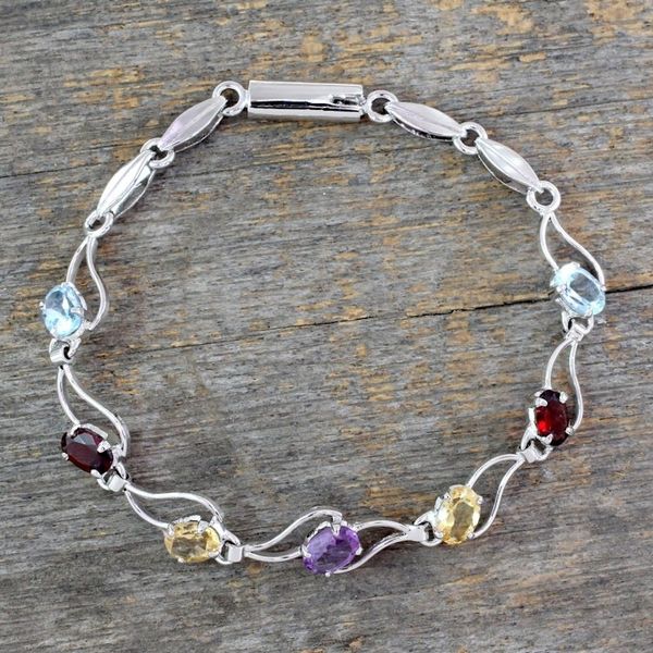 Alternate image for Garnet and blue topaz link bracelet Colors of Life