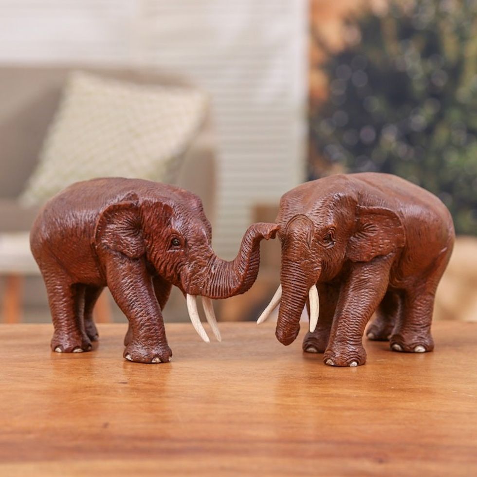2 Wood Sculptures of Elephants with their Trunks Up and Down 'Forever Love'