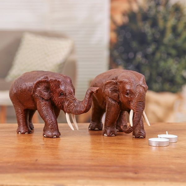 Alternate image for 2 Wood Sculptures of Elephants with their Trunks Up and Down Forever Love