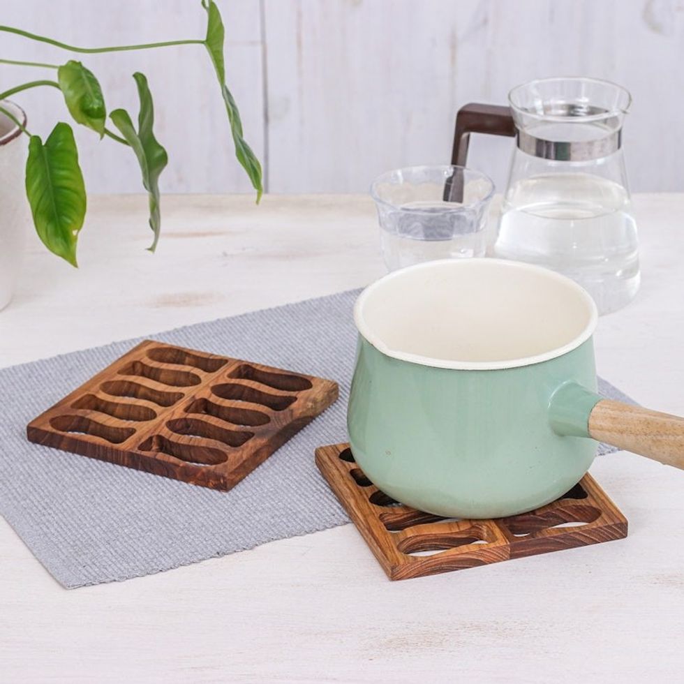 Fish-Themed Hand-Carved Square Brown Teak Wood Pot Stand 'Swimming Delicacies'