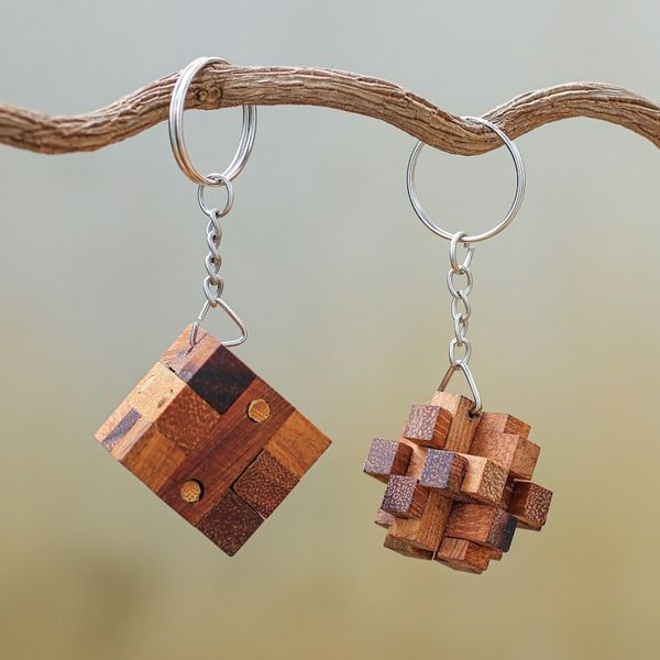 Alternate image for Wooden Puzzle Keyrings from Thailand Pair Nails and Squares