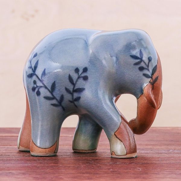 Alternate image for Hand Painted Celadon Ceramic Elephant Sculpture Walkabout