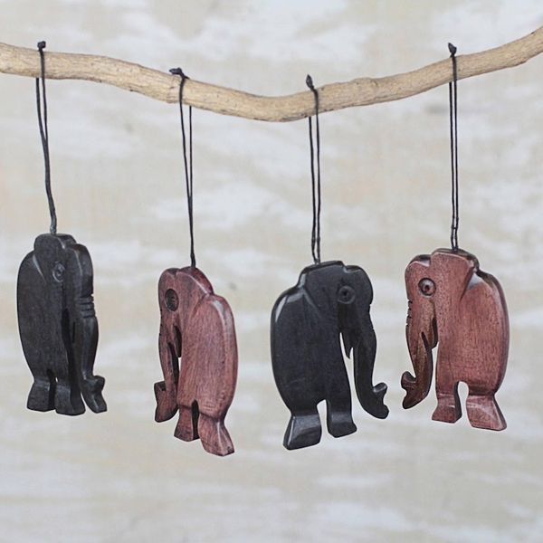 Alternate image for Handcrafted Ebony Wood Walking Elephant Ornaments Set of 4 Jungle Jaunt