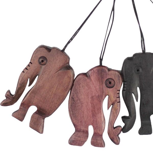 Alternate image for Handcrafted Ebony Wood Walking Elephant Ornaments Set of 4 Jungle Jaunt