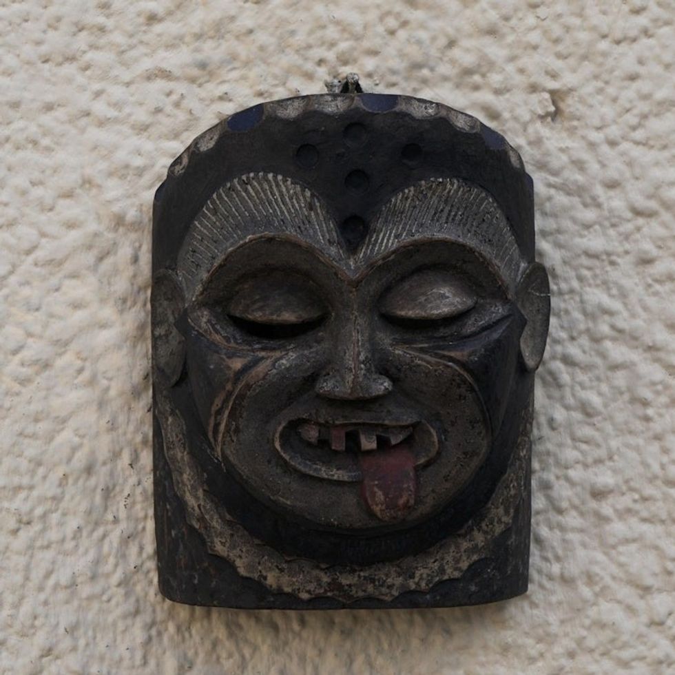 Hand Carved Sese Wood Wall Mask 'Making Mischief'