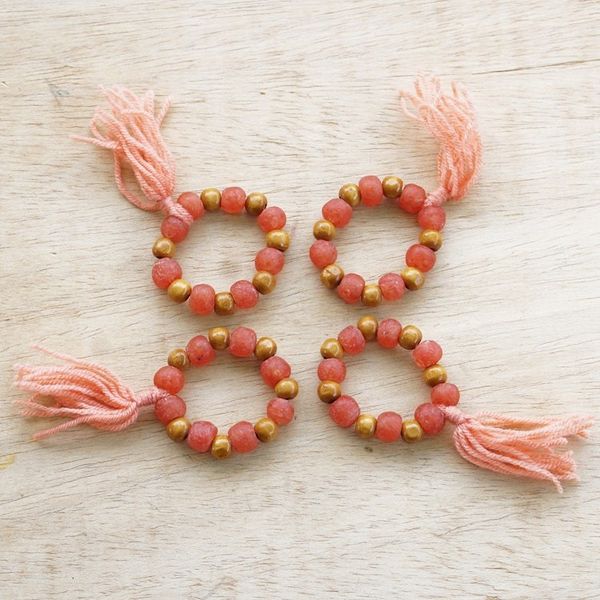 Alternate image for 4 Wood and Recycled Glass Beaded Napkin Rings with Tassels Ghanaian Hospitality