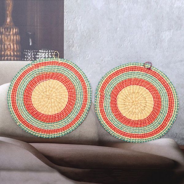 Alternate image for Pair of Round Turquoise and Fuchsia Raffia Wall Accents Ghanaian Suns