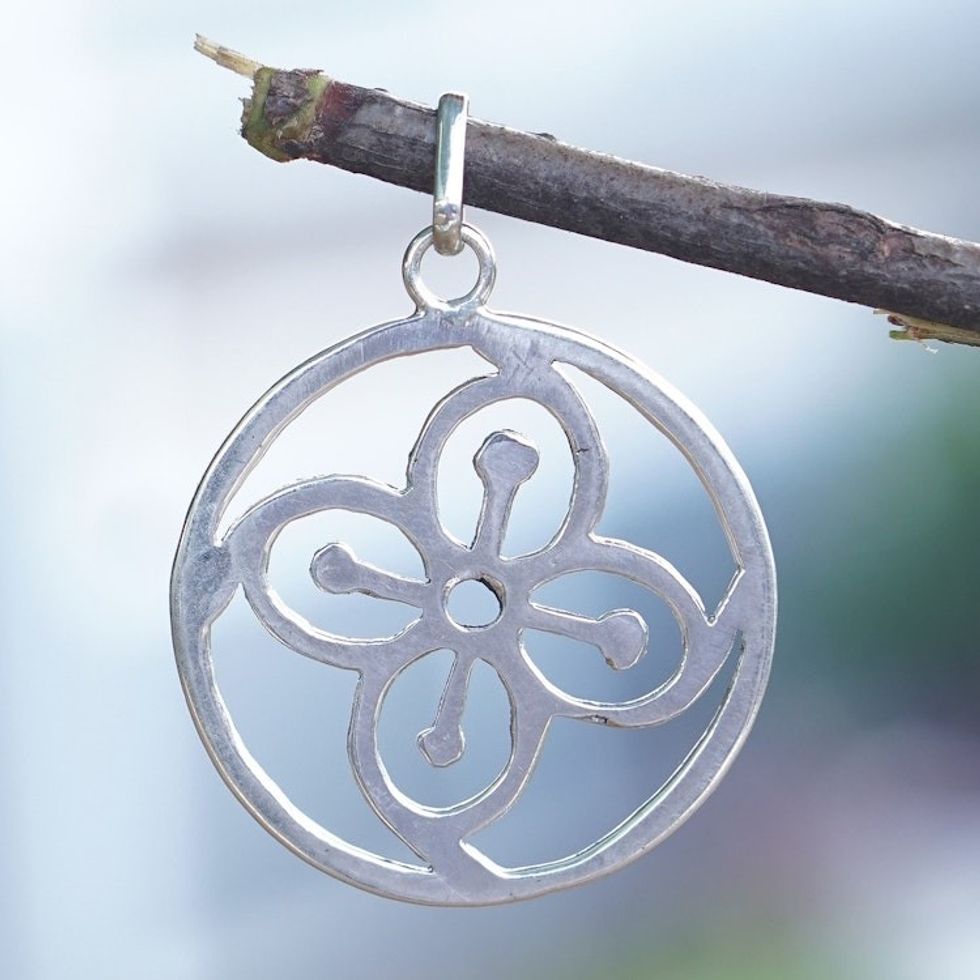 Sterling Silver Round Pendant with Flower Icon from Ghana 'Abundance Core'