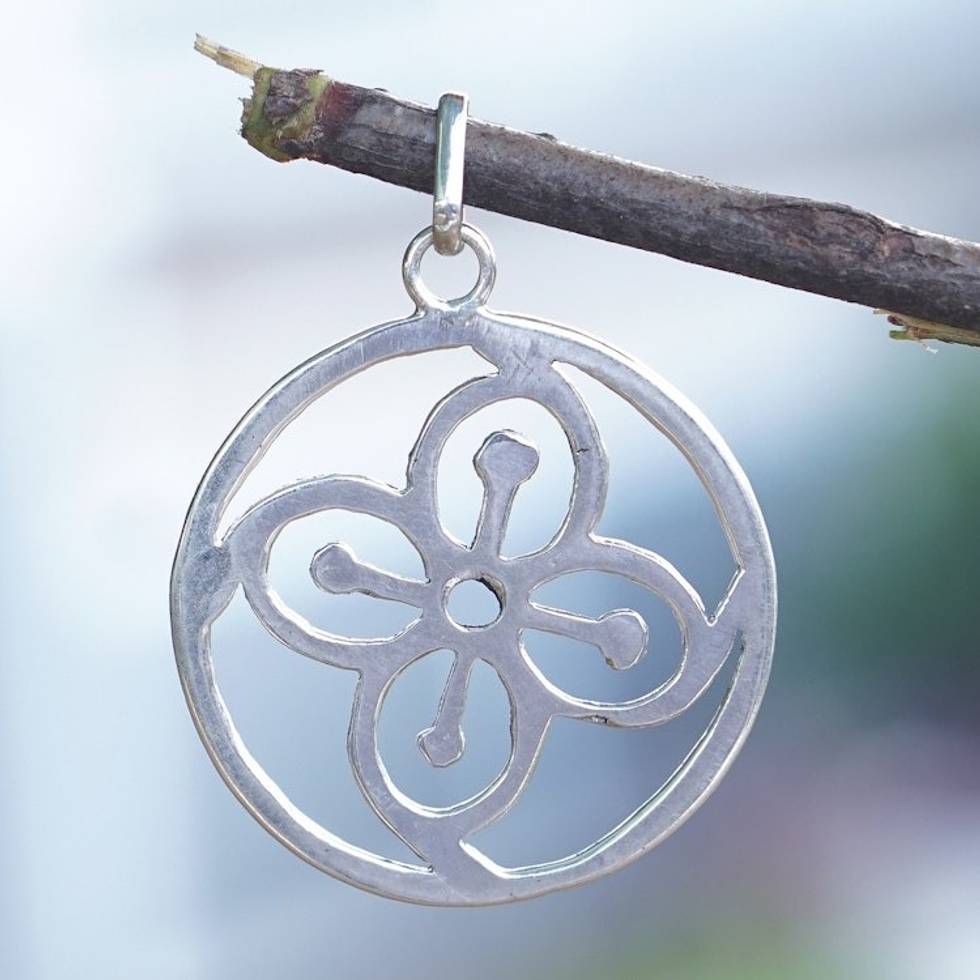 Sterling Silver Round Pendant with Flower Icon from Ghana 'Abundance Core'