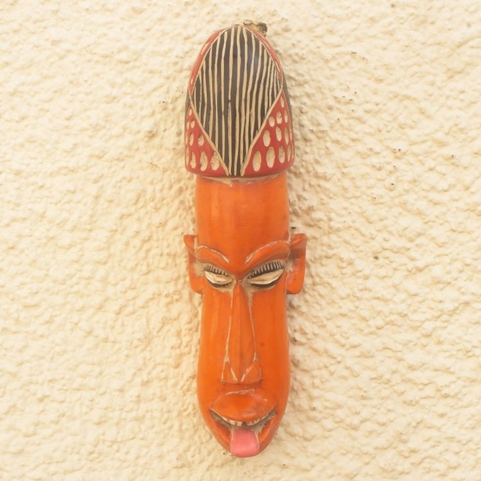 Artisan Crafted Orange Sese Wood Mask 'Segbefia'