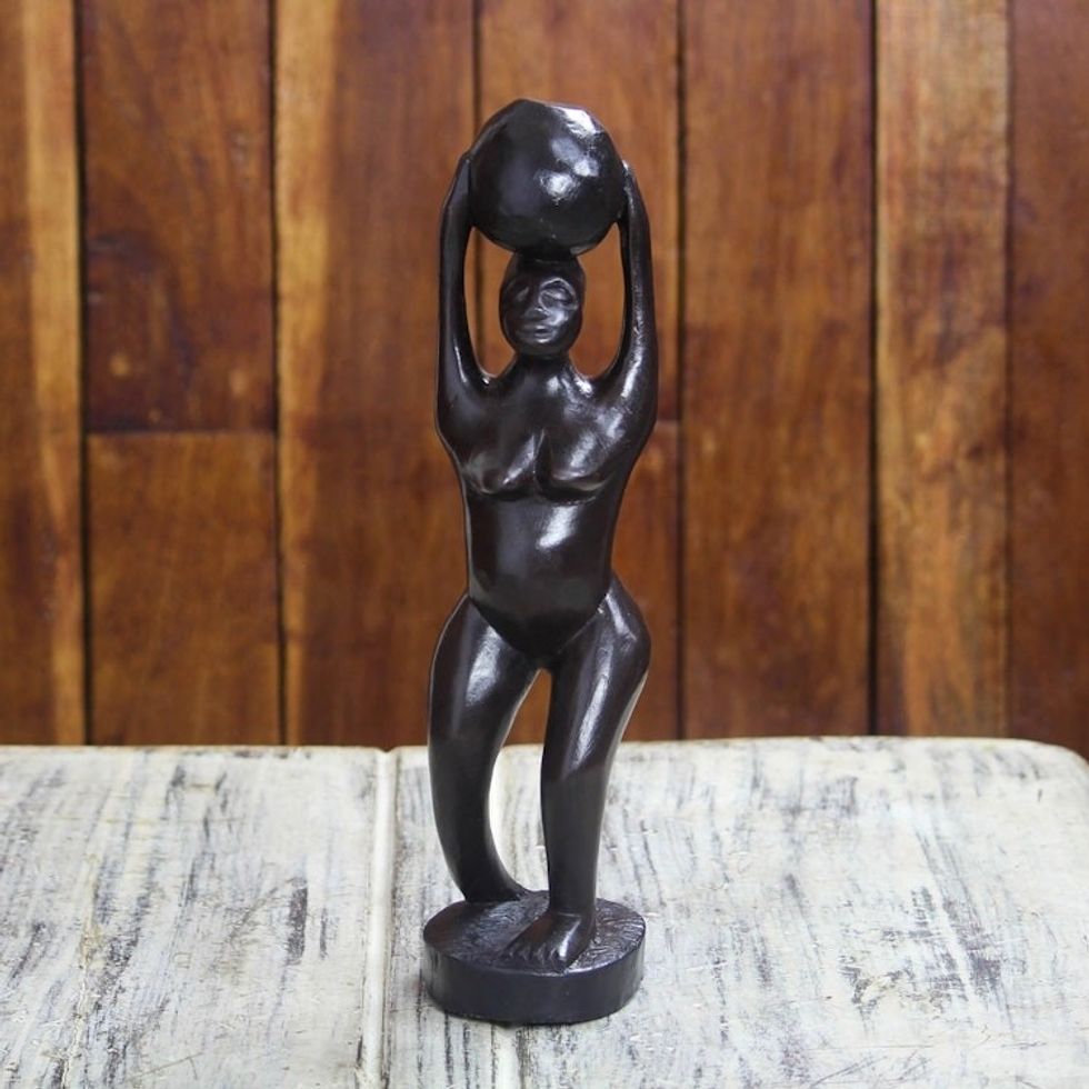 Black Sese Wood Sculpture of a Woman with a Pot from Ghana 'Nea Oko Nsu'