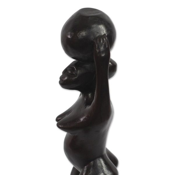 Alternate image for Black Sese Wood Sculpture of a Woman with a Pot from Ghana Nea Oko Nsu