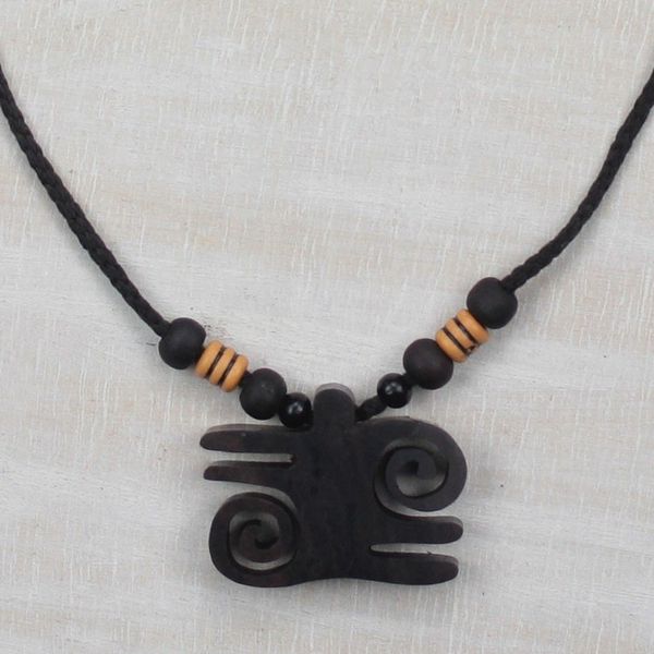 Alternate image for Ebony Wood and Recycled Plastic Adinkra Necklace from Ghana Kwatakye Atiko Curls