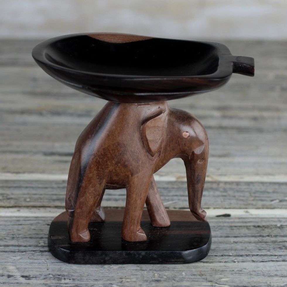 Handcrafted Ebony Wood Elephant Mini Catchall from Ghana 'Elephant Carrying a Leaf'