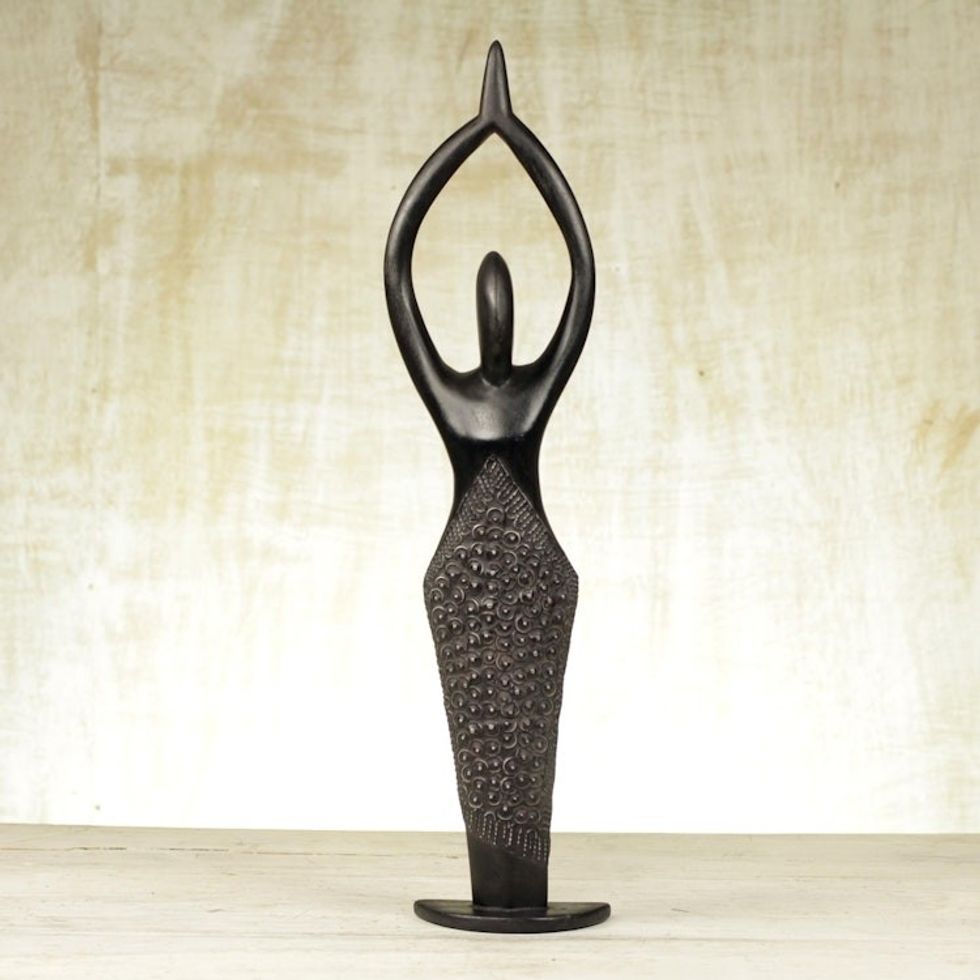 Wood sculpture 'African Woman Loves Life'