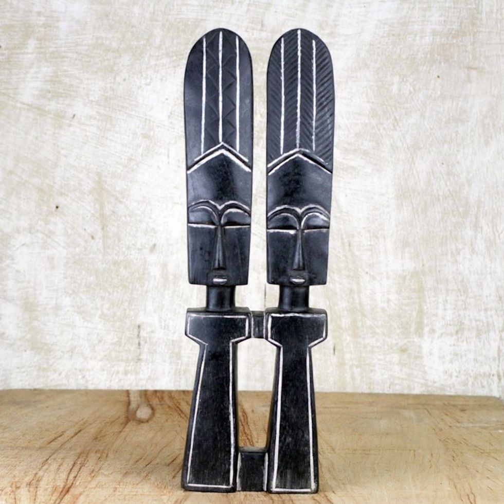 Wood sculpture 'We Are Sisters'