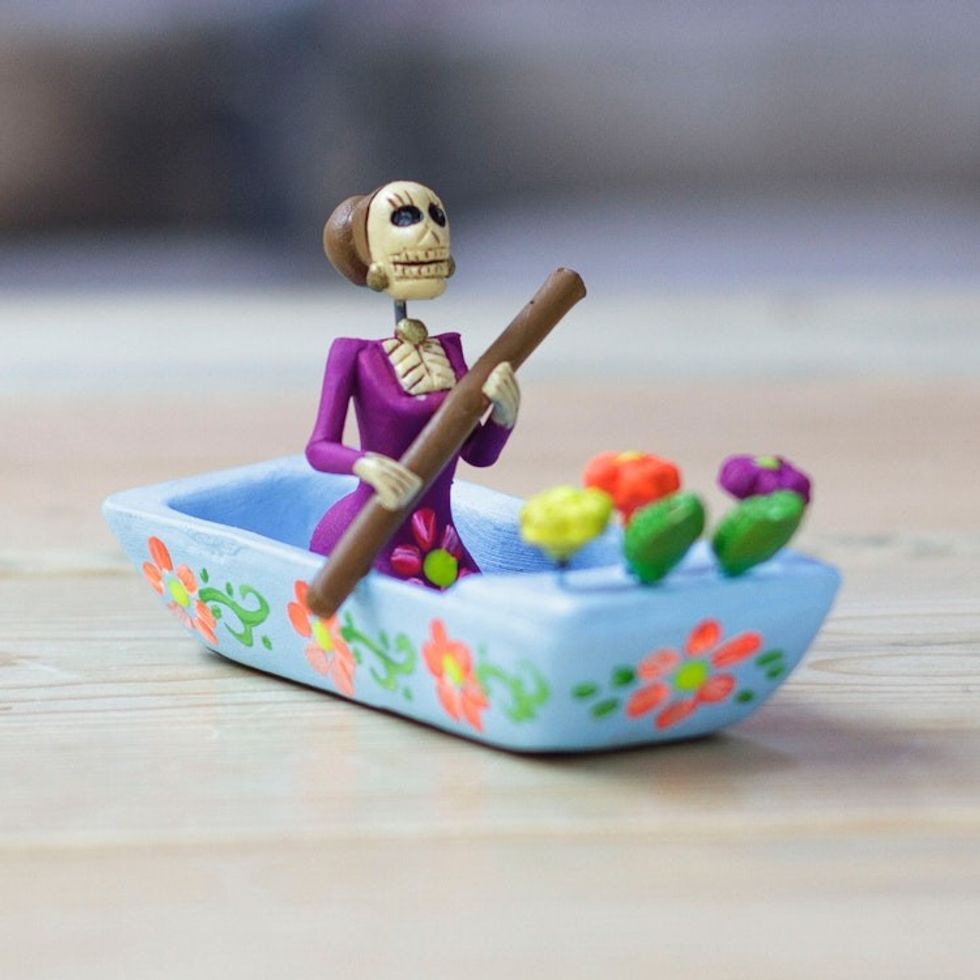 Hand-Painted Catrina on a Boat Ceramic Figurine in Blue 'River Catrina in Blue'
