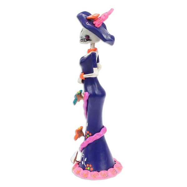 Alternate image for Painted Butterfly Lady Catrina Ceramic Sculpture in Blue Lady Catrina at Night