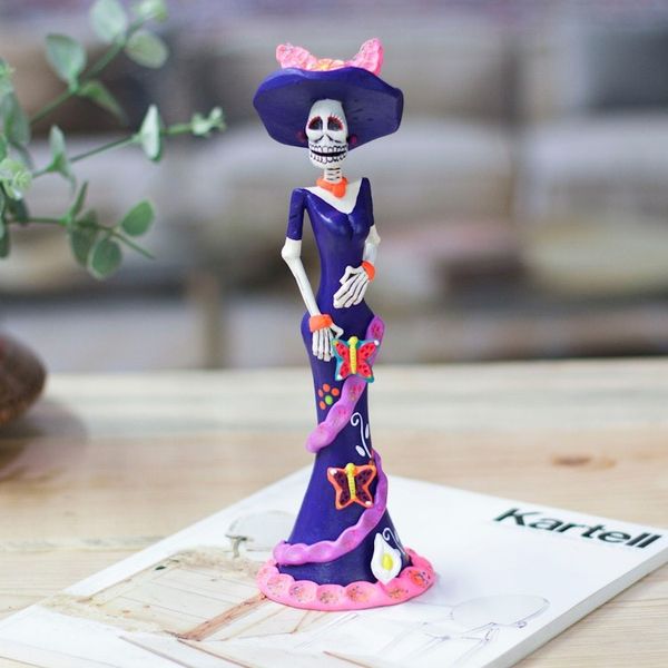 Alternate image for Painted Butterfly Lady Catrina Ceramic Sculpture in Blue Lady Catrina at Night