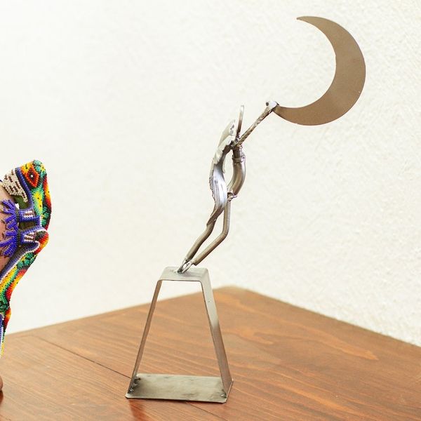 Alternate image for Angel-themed Recycled Metal Sculpture Capture the Moon