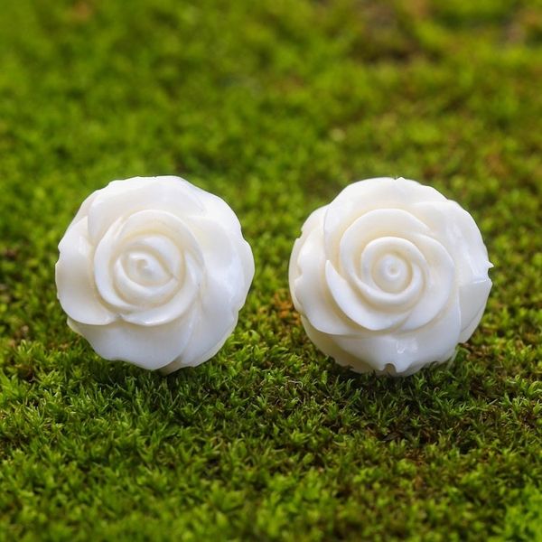 Alternate image for Hand-Carved Bone Rose Button Earrings from Bali Fascinating Roses