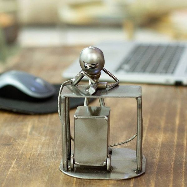 Alternate image for Upcycled Metal Auto Part Sculpture of a Welder from Mexico Concentrating Welder