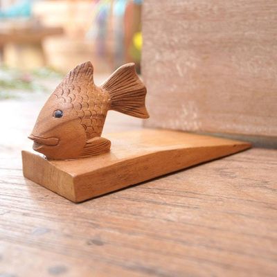 Main image for Handcrafted Suar Wood Fish Doorstop in Brown from Bali Helpful Goldfish in Brown