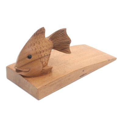 Alternate image for Handcrafted Suar Wood Fish Doorstop in Brown from Bali Helpful Goldfish in Brown
