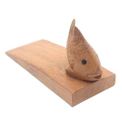 Alternate image for Handcrafted Suar Wood Fish Doorstop in Brown from Bali Helpful Goldfish in Brown