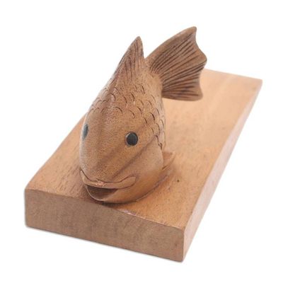 Alternate image for Handcrafted Suar Wood Fish Doorstop in Brown from Bali Helpful Goldfish in Brown