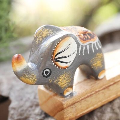 Alternate image for Handcrafted Elephant-Themed Grey Jempinis Wood Door Stopper Tiny Giant