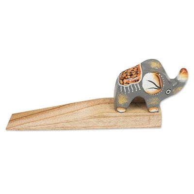 Alternate image for Handcrafted Elephant-Themed Grey Jempinis Wood Door Stopper Tiny Giant