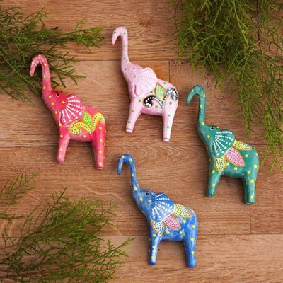 Alternate image for Set of 4 Painted Tropical Albesia Wood Elephant Ornaments Cheerful Elephants