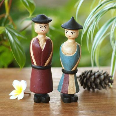 Alternate image for Hand Carved Wood Figurines of a Farmer Couple from Bali Happy Farmers
