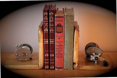 Alternate image for Rustic Fishing Bookends – Handmade in Idaho with Baitcasting Reel & Bass Accent