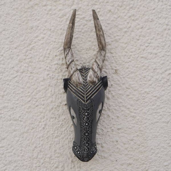 Alternate image for Hand Carved African Wood Antelope Mask with Aluminum Accents Mighty Antelope