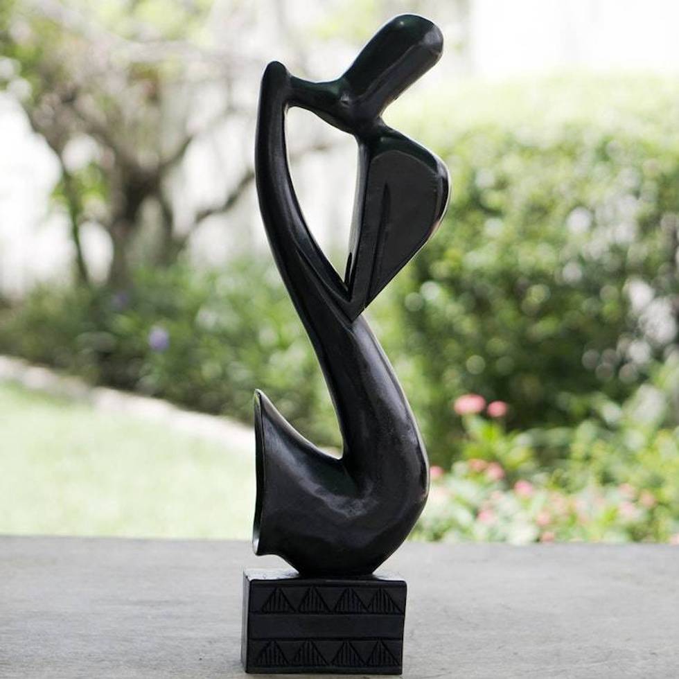 Wood sculpture 'Man and Sax'