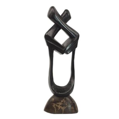Alternate image for World Peace-themed wood sculpture Brotherly Love