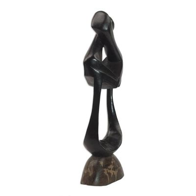 Alternate image for World Peace-themed wood sculpture Brotherly Love