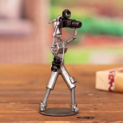 Alternate image for Recycled Auto Part Sculpture of a Photographer from Peru Say Cheese
