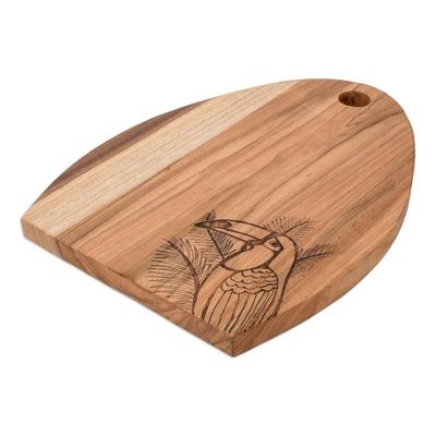 Alternate image for Semi-Oval Laurel Wood Cutting Board with Toucan Engraving Toucans Treats