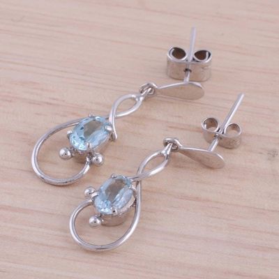 Alternate image for Rhodium Plated Blue Topaz Dangle Earrings from India Beauty Swirls