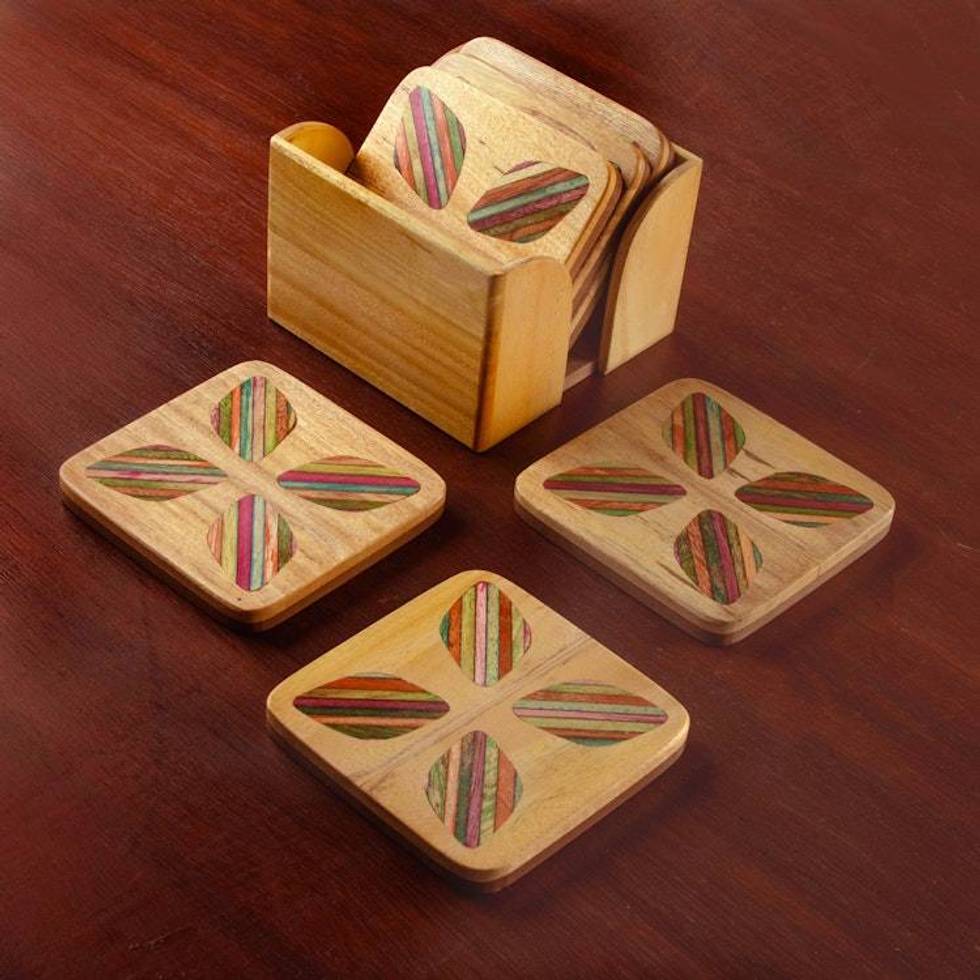 Hand-Carved Floral 6-Piece Mango and Haldu Wood Coaster Set 'Petal Celebration'