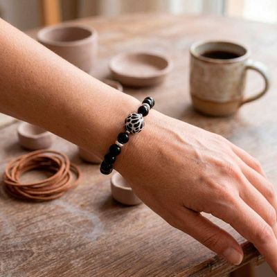 Alternate image for Agate Stretch Bracelet with Talavera Style Ceramic Pendant Black Feather Delight