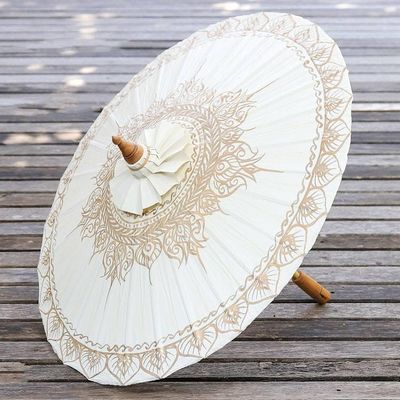 Alternate image for Saa Paper Parasol in White with Gold Accents from Thailand Motifs on White