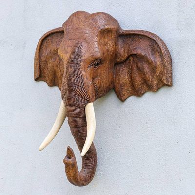 Alternate image for Hand Carved Teak Wood Elephant Sculpture Knowing in Brown
