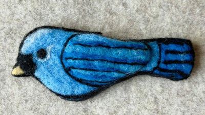 Alternate image for Needle felted blue jay bird pin, carefully crafted from wool to create a small, lightweight brooch.