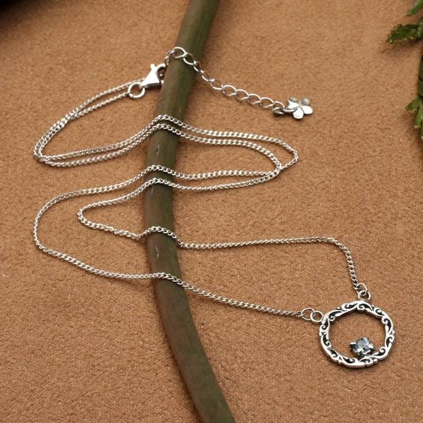 Alternate image for Blue Topaz Silver Necklace with Circular Leaf-Themed Pendant Botanical Radiance